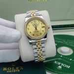 ساعت زنانه رولکس سایز مدیوم نگین مخراج شده عدد عربی زرد Rolex