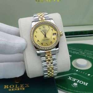 ساعت زنانه رولکس سایز مدیوم نگین مخراج شده عدد عربی زرد Rolex